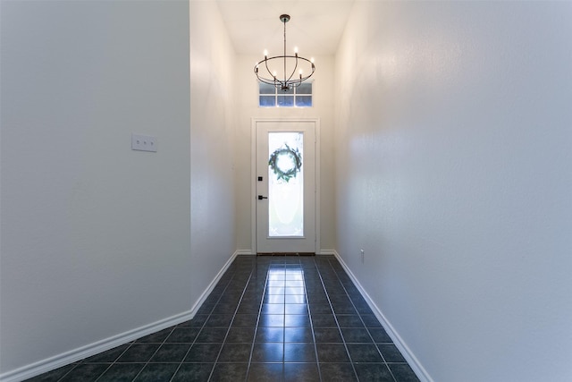 1526 Shadow Run, Weatherford, TX 76086 - entryway featuring a chandelier and dark tile patterned floors