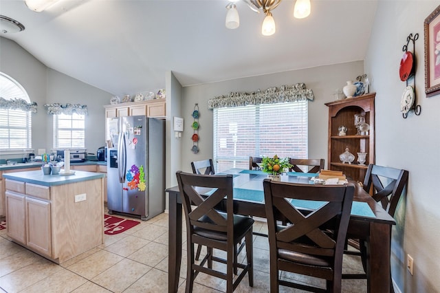 5615 Wellston Dr, Arlington, TX 76018 - dining room with lofted ceiling and light tile patterned floors