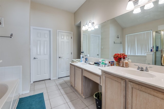 5615 Wellston Dr, Arlington, TX 76018 - bathroom featuring tile patterned flooring, double vanity, a garden tub, and a stall shower