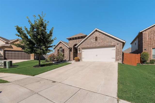 6159 Allatoona Rd, Fort Worth, TX 76179 - view of front of house with driveway, brick siding, and an attached garage