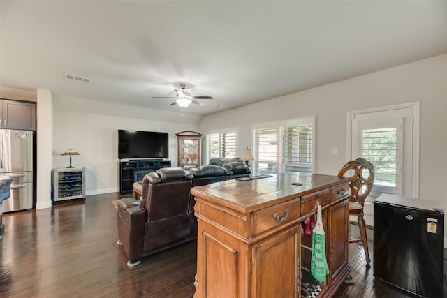 6159 Allatoona Rd, Fort Worth, TX 76179 - living area with wine cooler, a ceiling fan, and dark wood finished floors