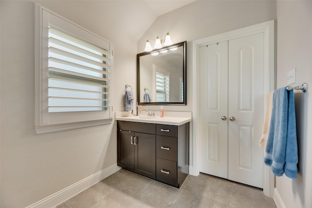 6159 Allatoona Rd, Fort Worth, TX 76179 - bathroom featuring vanity, vaulted ceiling, and tile patterned flooring