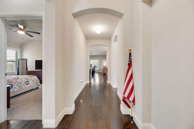 6159 Allatoona Rd, Fort Worth, TX 76179 - hallway with arched walkways and dark wood-style flooring