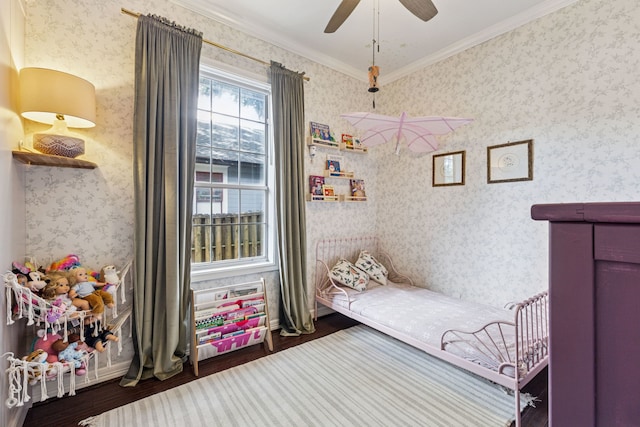 522 S Winnetka Ave, Dallas, TX 75208 - bedroom featuring wood finished floors, ornamental molding, and wallpapered walls