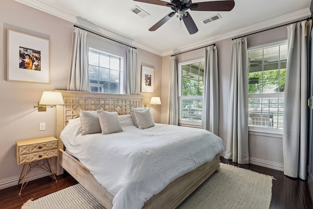 522 S Winnetka Ave, Dallas, TX 75208 - bedroom featuring dark wood finished floors, ornamental molding, and ceiling fan
