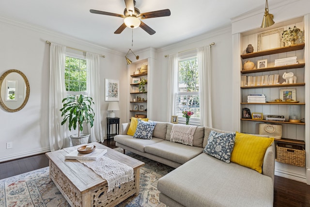 522 S Winnetka Ave, Dallas, TX 75208 - living area featuring healthy amount of natural light, dark wood-style floors, ornamental molding, a ceiling fan, and built in features