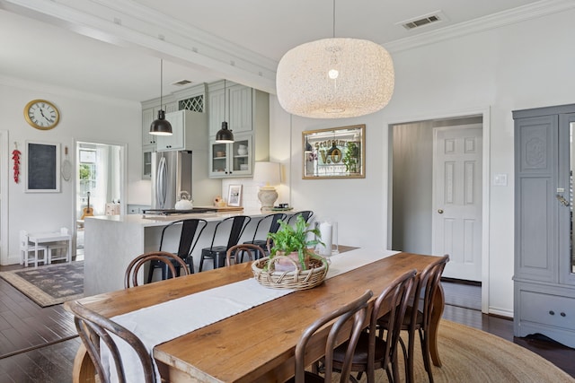 522 S Winnetka Ave, Dallas, TX 75208 - dining room with crown molding and dark wood-style floors