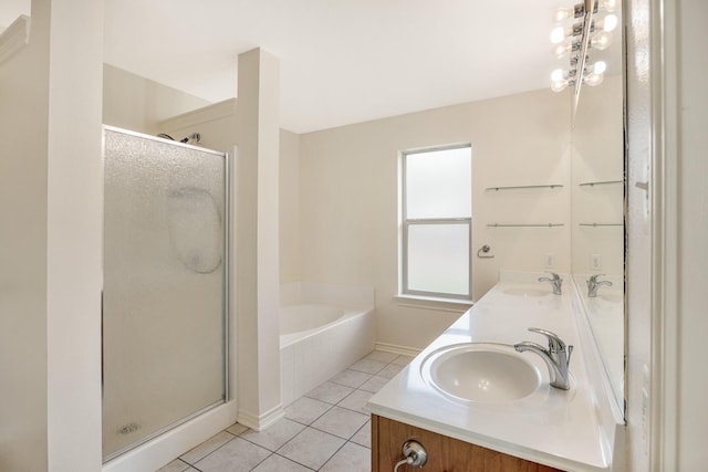 6630 Lacebark Cir, Tyler, TX 75703 - full bathroom featuring a shower stall, a garden tub, tile patterned floors, and double vanity