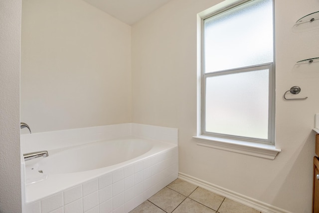 6630 Lacebark Cir, Tyler, TX 75703 - bathroom with healthy amount of natural light, a bath, tile patterned floors, and vanity