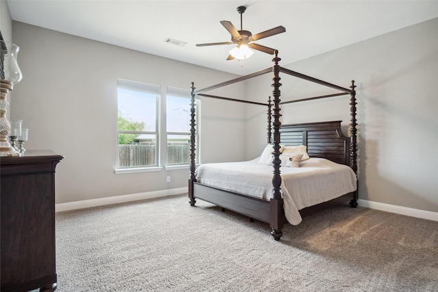 5009 Thistle Hl, Denton, TX 76210 - carpeted bedroom with baseboards and a ceiling fan