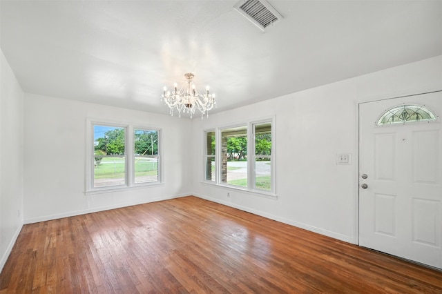 125 Sandra Dr, Azle, TX 76020 - entrance foyer with a chandelier and hardwood / wood-style floors
