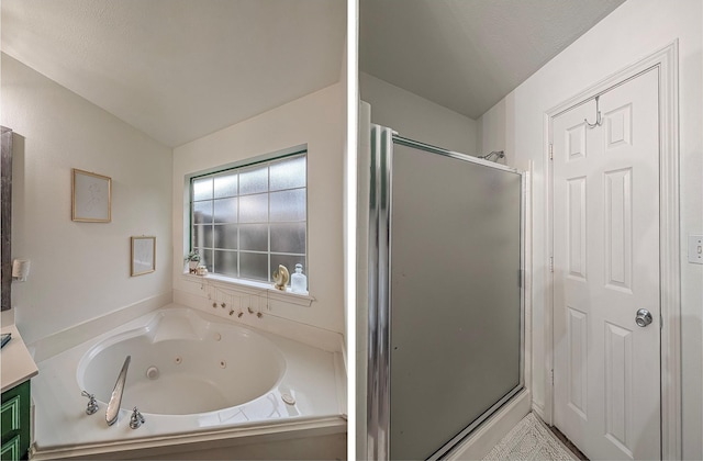 114 Bluebird Ln, Whitehouse, TX 75791 - full bathroom featuring a stall shower, a tub with jets, and vanity
