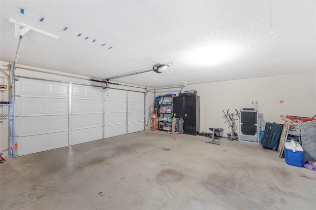 114 Bluebird Ln, Whitehouse, TX 75791 - garage featuring a garage door opener