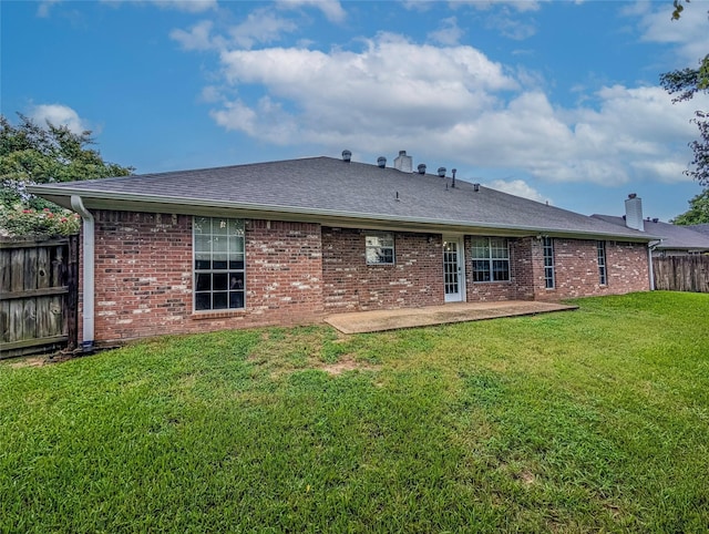 114 Bluebird Ln, Whitehouse, TX 75791 - back of property with a chimney, a patio area, brick siding, and roof with shingles