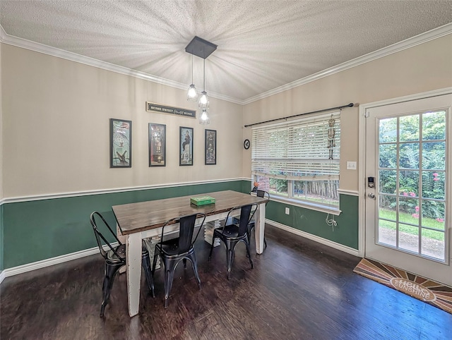 114 Bluebird Ln, Whitehouse, TX 75791 - dining area with wood finished floors, plenty of natural light, ornamental molding, and a textured ceiling