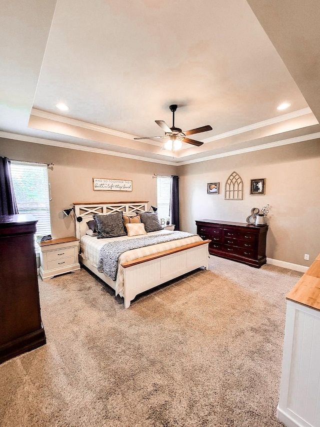 104 St Andrews Ln, Benton, LA 71006 - carpeted bedroom featuring a tray ceiling, multiple windows, ornamental molding, a ceiling fan, and recessed lighting