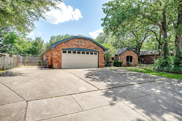 6824 Ridgewood Dr, North Richland Hills, TX 76182 - view of front of property with brick siding, a garage, and concrete driveway