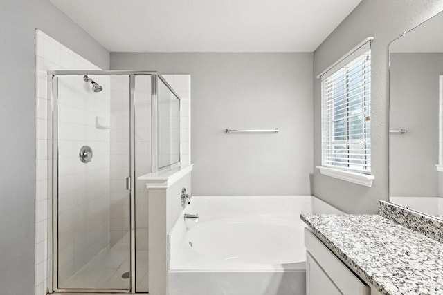 921 Englewood Ln, Plano, TX 75025 - full bathroom with a bath, vanity, and a shower stall
