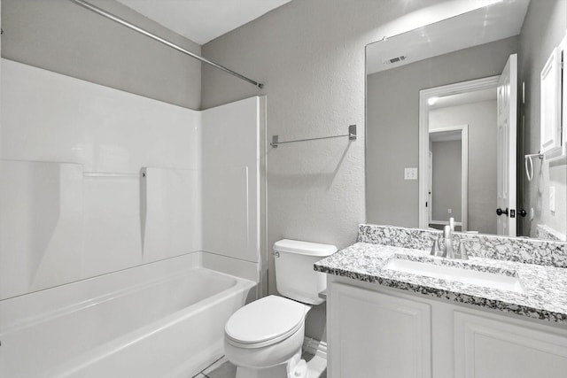 921 Englewood Ln, Plano, TX 75025 - full bathroom with vanity, bathtub / shower combination, and a textured wall
