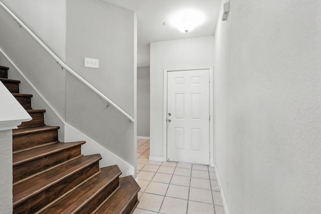 921 Englewood Ln, Plano, TX 75025 - entrance foyer featuring light tile patterned flooring and stairway