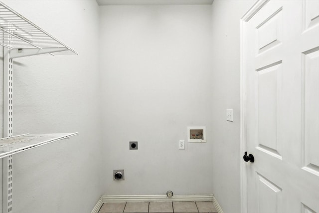 921 Englewood Ln, Plano, TX 75025 - laundry area featuring washer hookup, electric dryer hookup, and light tile patterned floors