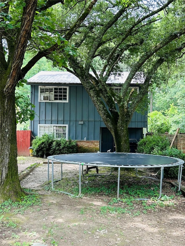 267 Washington, Avinger, TX 75630 - view of outdoor structure featuring a trampoline