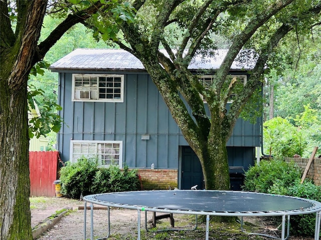 267 Washington, Avinger, TX 75630 - view of outdoor structure with a trampoline and cooling unit