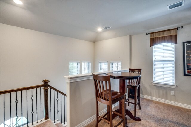 655 Emily Ln, Richardson, TX 75081 - carpeted dining space featuring baseboards