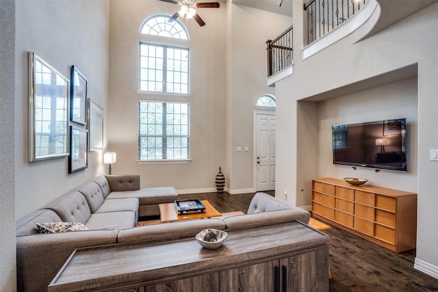 655 Emily Ln, Richardson, TX 75081 - living area featuring a towering ceiling, dark wood-type flooring, and a ceiling fan