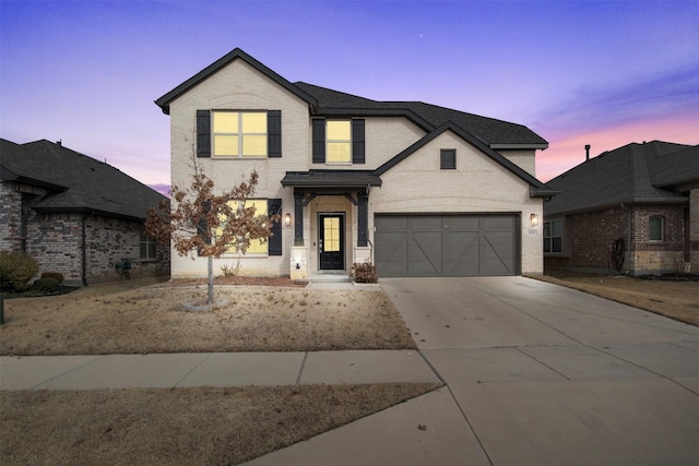 6205 Kent Ln, Celina, TX 76227 - view of front of house featuring brick siding, concrete driveway, and roof with shingles