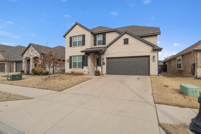 6205 Kent Ln, Celina, TX 76227 - traditional-style home featuring brick siding, concrete driveway, and a shingled roof