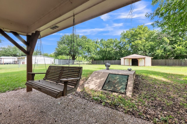 1652 Ernie Ln, Grand Prairie, TX 75052 - fenced backyard with an outbuilding