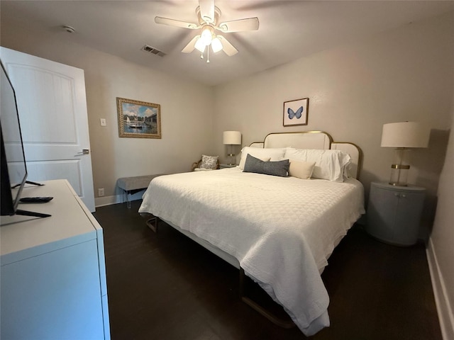 317 W Monterey St, Denison, TX 75020 - bedroom featuring dark wood-type flooring and a ceiling fan
