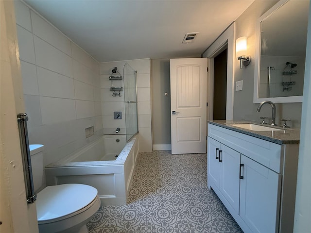 317 W Monterey St, Denison, TX 75020 - full bath featuring vanity, bathing tub / shower combination, and tile patterned floors