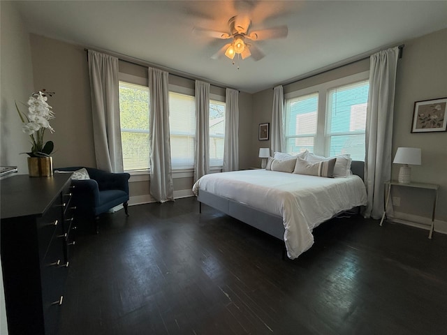317 W Monterey St, Denison, TX 75020 - bedroom featuring dark wood finished floors and ceiling fan