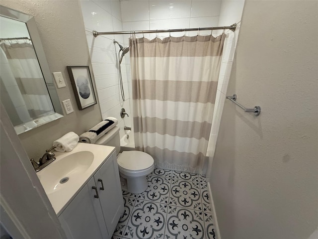 317 W Monterey St, Denison, TX 75020 - full bathroom with a textured wall, vanity, tile patterned flooring, and curtained shower