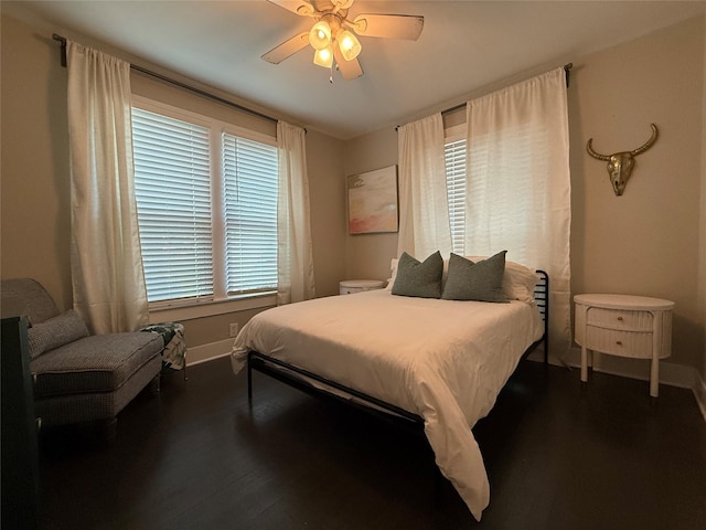 317 W Monterey St, Denison, TX 75020 - bedroom featuring dark wood-style floors and a ceiling fan