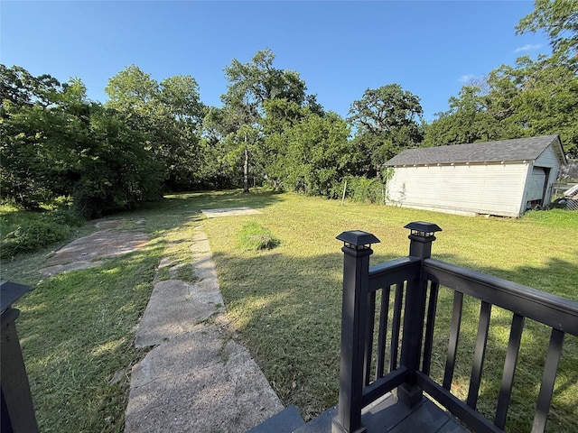 317 W Monterey St, Denison, TX 75020 - view of grassy yard featuring an outbuilding