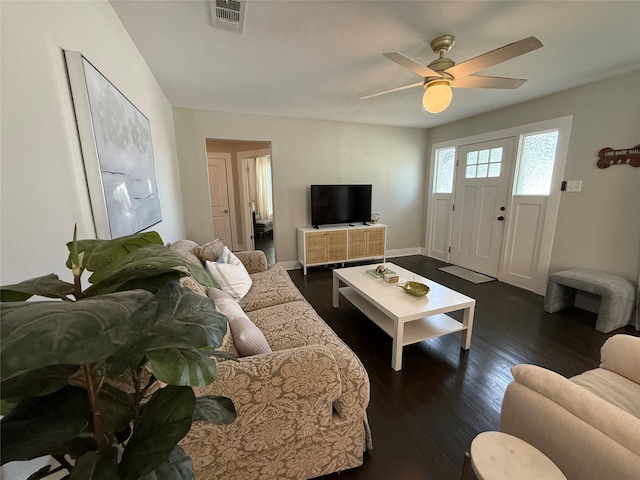 317 W Monterey St, Denison, TX 75020 - living area featuring dark wood finished floors and ceiling fan