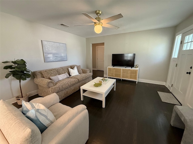 317 W Monterey St, Denison, TX 75020 - living area featuring a ceiling fan and dark wood-style floors