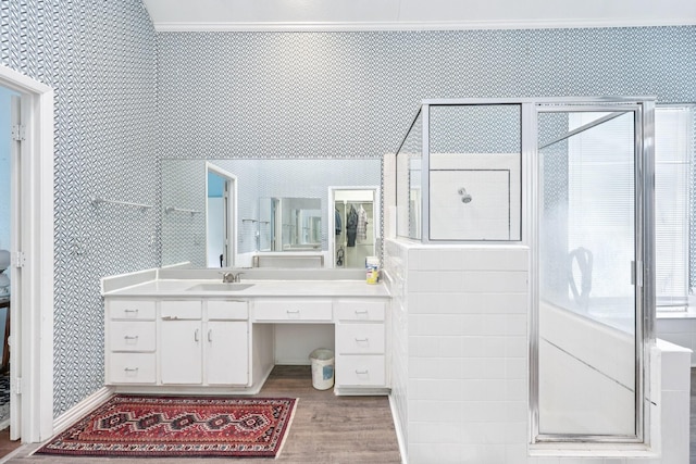 4653 Portrait Ln, Plano, TX 75024 - full bath featuring vanity, a shower stall, wood finished floors, and healthy amount of natural light