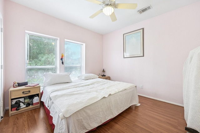 4653 Portrait Ln, Plano, TX 75024 - bedroom featuring wood finished floors and a ceiling fan