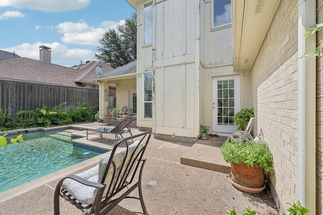 4653 Portrait Ln, Plano, TX 75024 - fenced backyard with a patio area