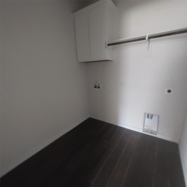 11305 Autry Ridge Ln, Aubrey, TX 76227 - laundry room with cabinet space, electric dryer hookup, hookup for a washing machine, dark wood-style floors, and hookup for a gas dryer