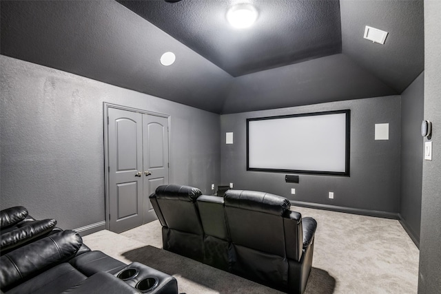539 Curtiss Dr, Fate, TX 75087 - carpeted home theater with a textured wall, a textured ceiling, and lofted ceiling