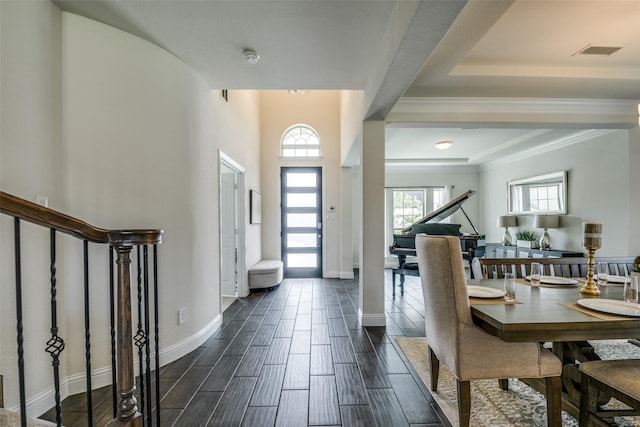 539 Curtiss Dr, Fate, TX 75087 - foyer entrance with stairs, wood finish floors, and ornamental molding