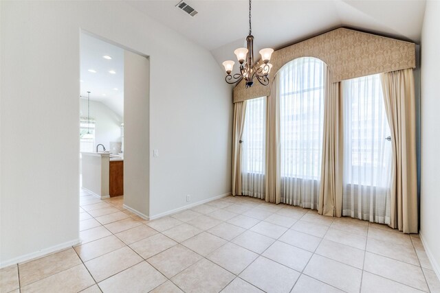 1809 N Holland Rd, Mansfield, TX 76063 - spare room with vaulted ceiling, a chandelier, and light tile patterned floors