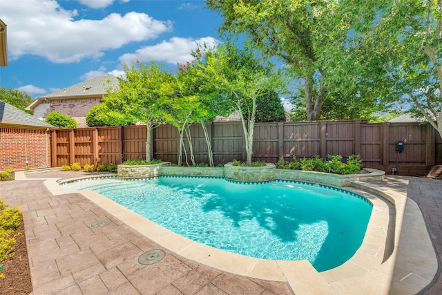 5701 Travis Dr, Frisco, TX 75034 - view of swimming pool featuring a fenced backyard and a patio