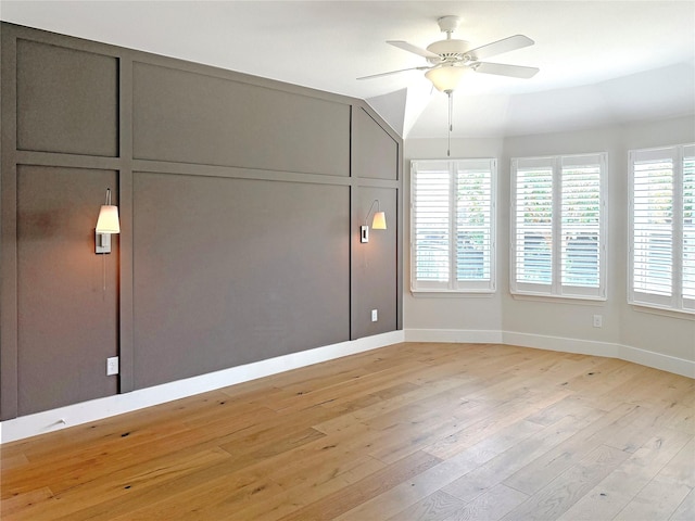 1129 Berrydale Dr, Northlake, TX 76226 - unfurnished room featuring light wood finished floors, vaulted ceiling, and ceiling fan