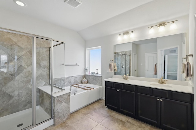 1129 Berrydale Dr, Northlake, TX 76226 - full bathroom featuring a garden tub, double vanity, a stall shower, lofted ceiling, and tile patterned floors